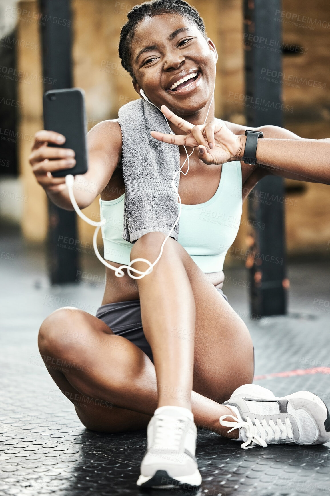 Buy stock photo Selfie, fitness and black girl in gym, earphones and peace sign for sport, social media and conversation on break. Training, practice and music listening with app, smile and relax in weekend