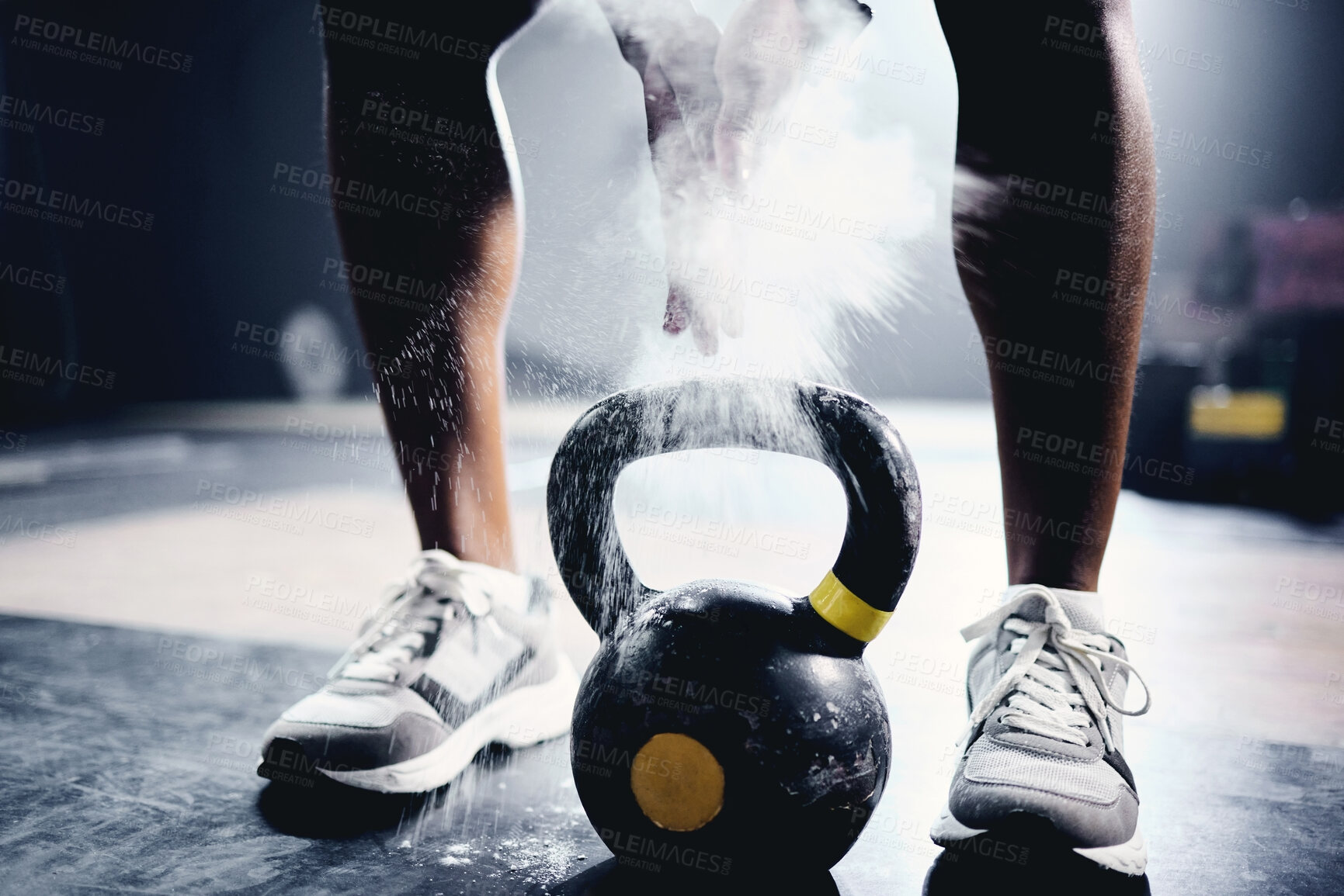 Buy stock photo Person, hand and kettlebell with powder at gym for strength training, grip and fitness challenge on floor. Athlete, bodybuilder and workout equipment for muscle exercise, power and chalk in body care
