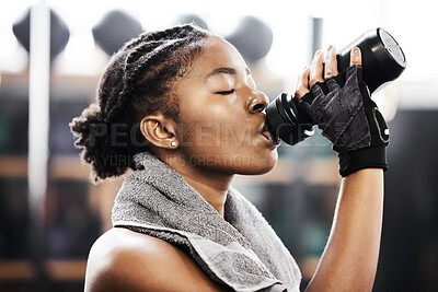 Buy stock photo Active, black woman and fitness by drinking water in gym for health or energy from training or workout. Sporty, female person and hydration for wellness or nutrition for routine with cardio
