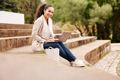 Buy stock photo Portrait of an attractive young female university student studying outside on campus during her break