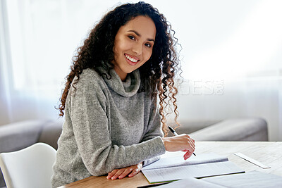 Buy stock photo Shot of a young woman working from home