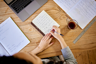 Buy stock photo Shot of a unrecognizable female working from home