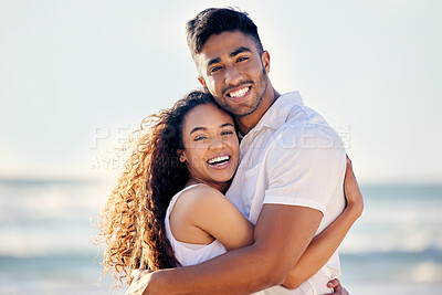 Buy stock photo Shot of a couple enjoying a day at the beach
