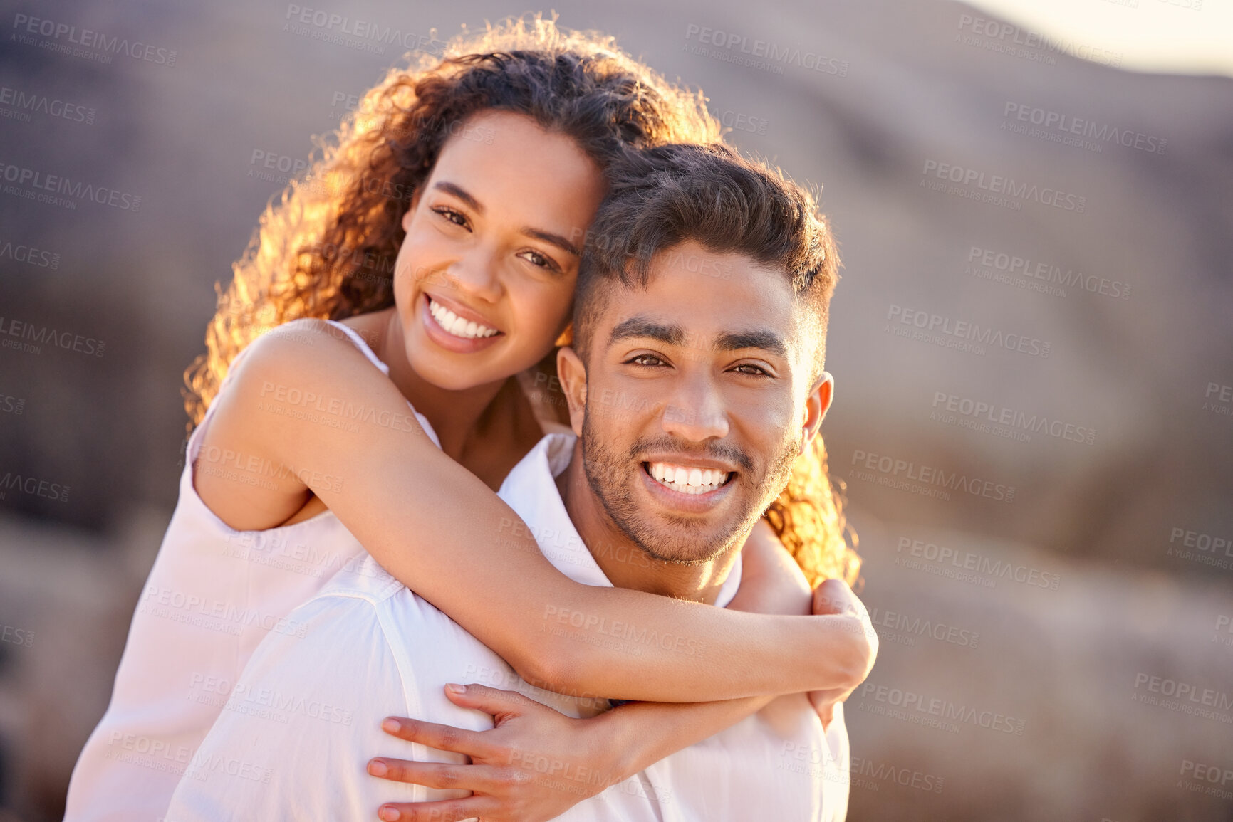 Buy stock photo Shot of a couple enjoying a day at the beach