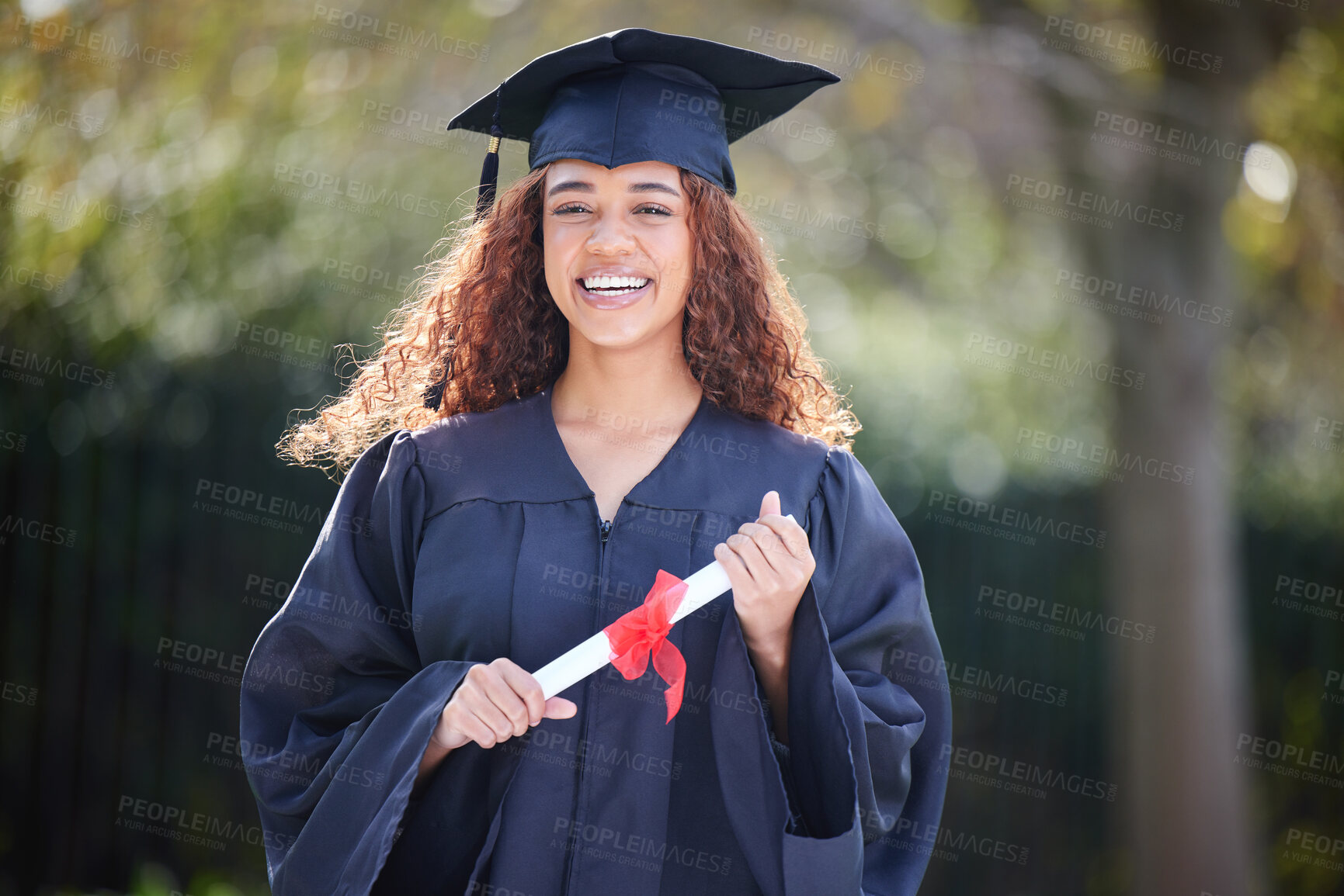 Buy stock photo University, smile and woman at graduation in park, ceremony or outdoor campus event with diploma. Certificate, pride and happy student in college achievement for education, opportunity or scholarship