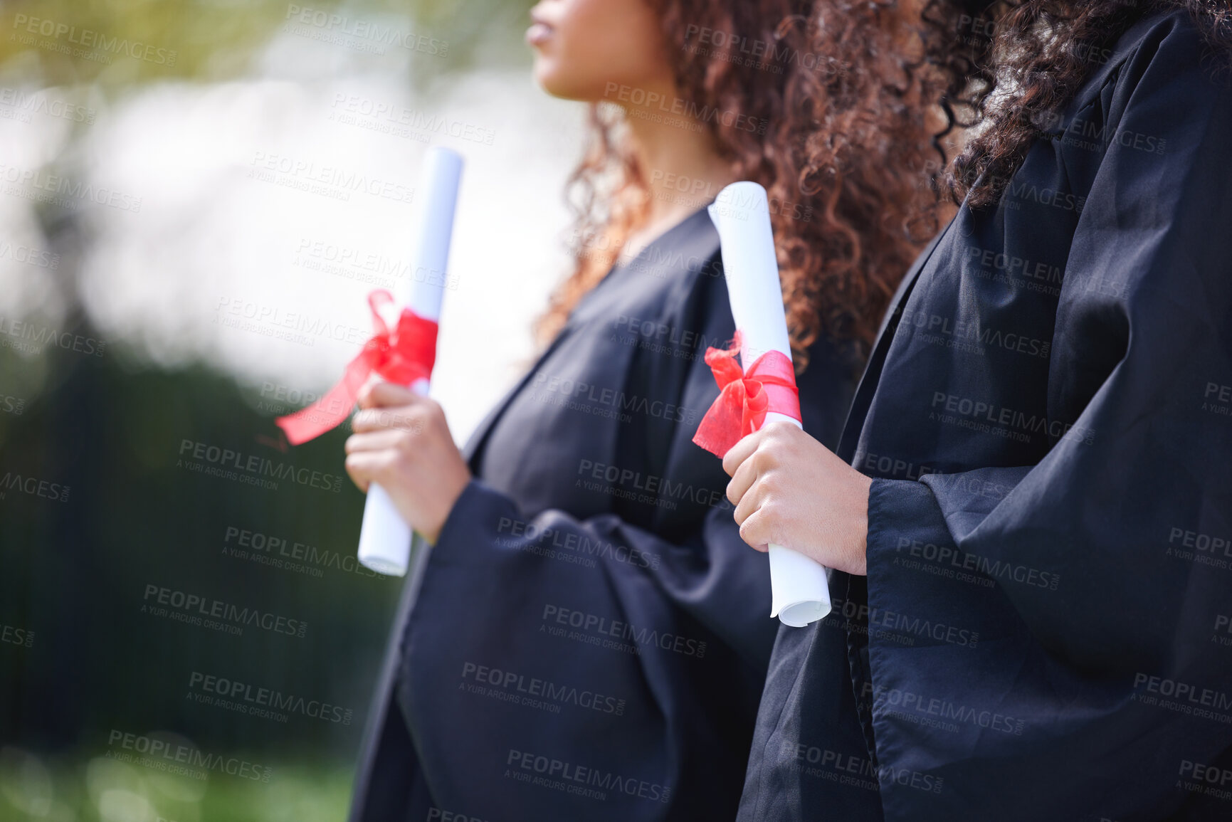 Buy stock photo University, hands and women with certificate at graduation, ceremony or outdoor campus event together. Diploma, pride and students with college achievement for education, opportunity or scholarship