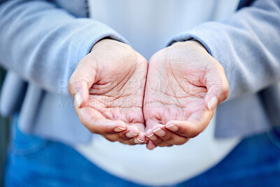 Buy stock photo Closeup shot of an unrecognizable businessman standing with his hands cupped together