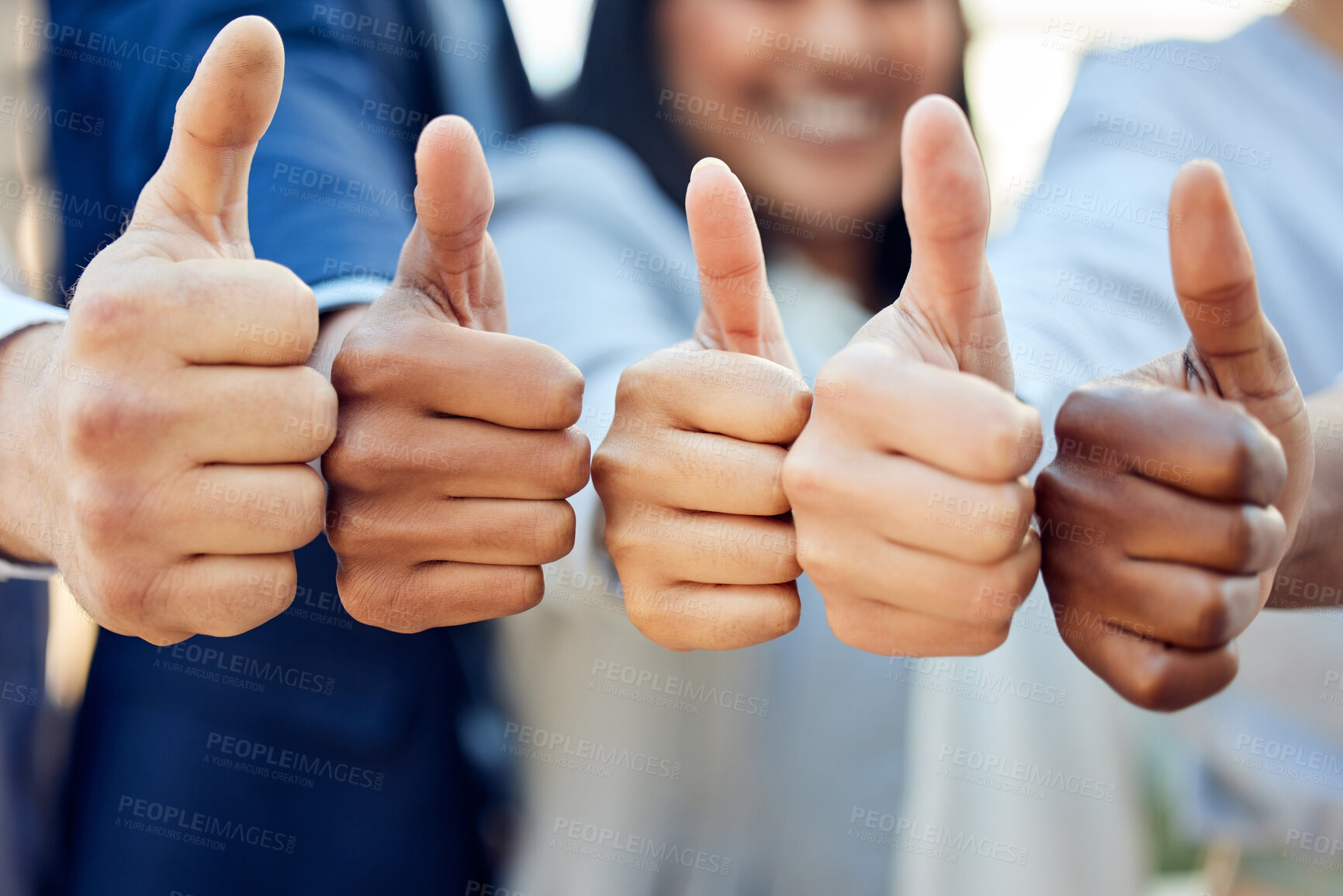 Buy stock photo Shot of a group of unrecognizable businesspeople showing a thumbs up