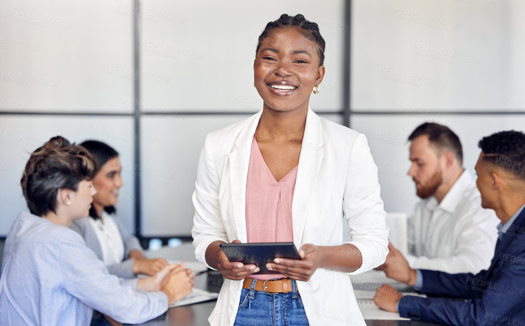 Buy stock photo Shot of a young businesswoman in the middle of a meeting