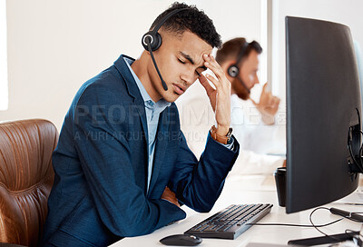 Buy stock photo Mental health, man with headache and headset with computer at his desk of a modern office workplace. Telemarketing or customer service, burnout or depression and male person sad at his workstation