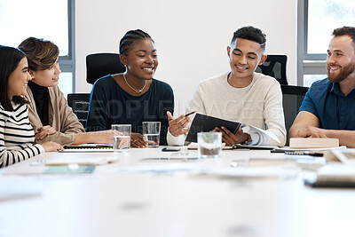 Buy stock photo Shot of a group of business people during a meeting