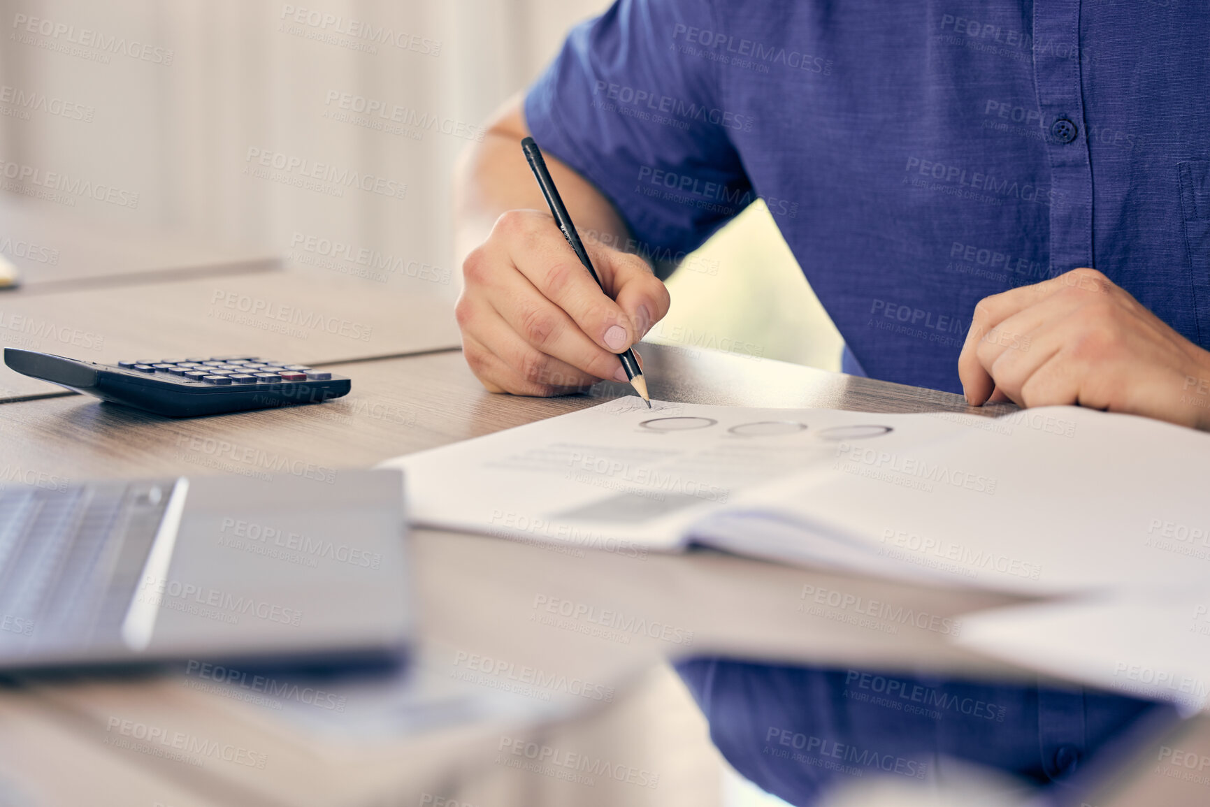 Buy stock photo Cropped shot of an unrecognizable man filling in paperwork at work