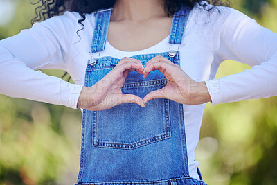 Buy stock photo Woman, hands and heart shape in outdoor with love, support and care for gardening in backyard at house in summer. Emoji, sign and hope in nature with trust, peace and wellness for garden growth goal