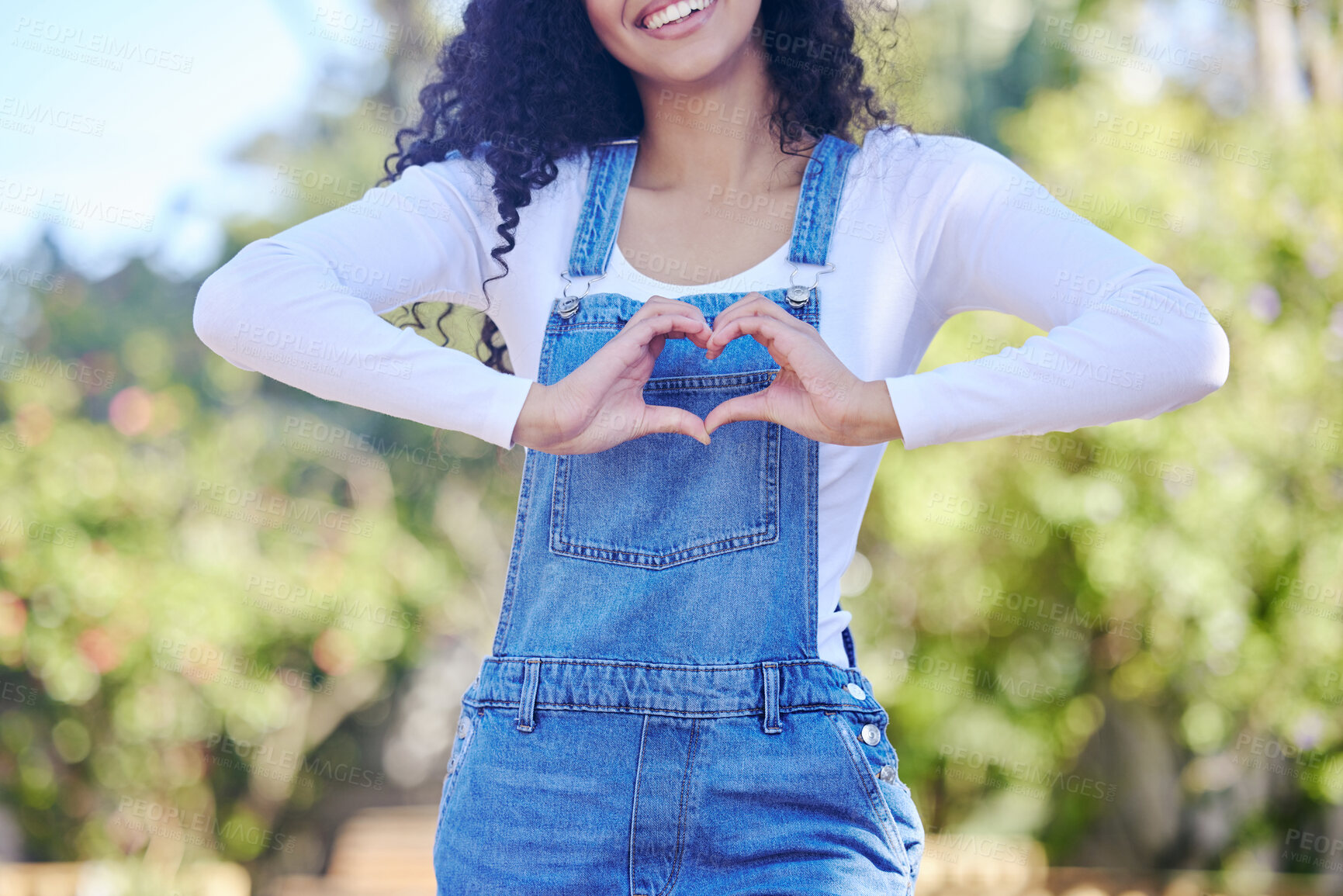 Buy stock photo Smile, woman and hands for heart outdoor with love, support and care for gardening in backyard at house in summer. Emoji, sign and nature with trust, peace and wellness for plant growth goal