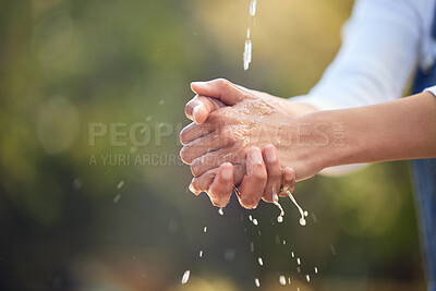 Buy stock photo Person, outdoor and water for washing hands in nature for germs, health care and sanitation for wellness in countryside. Woman, farmer and cleaning in environment with h2o for sustainability and eco.