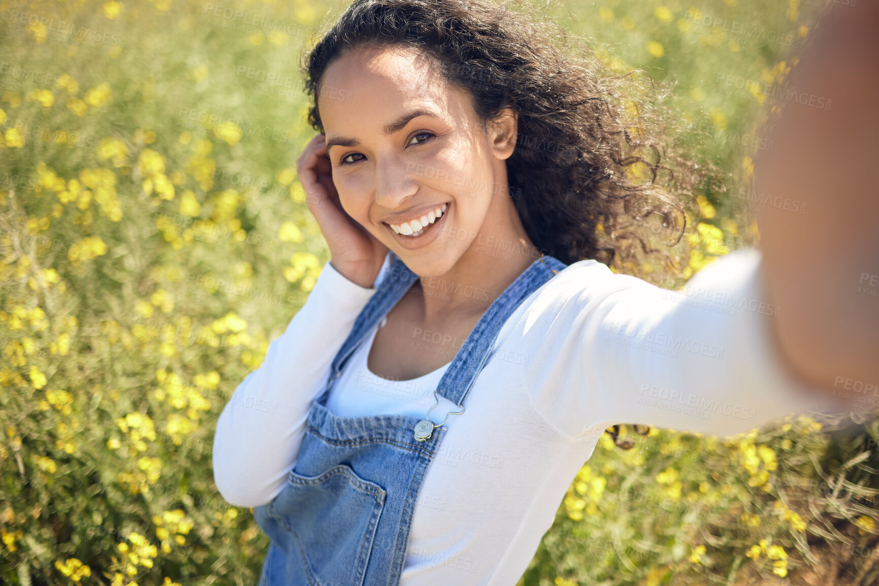 Buy stock photo Woman, selfie and smile with field, nature and flowers with portrait for sustainable farming. Farmer, agriculture and ecology with meadow, environment or ecology for carbon capture or green love