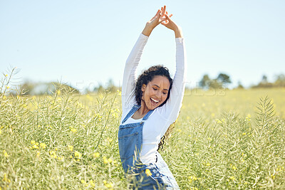 Buy stock photo Woman, freedom and smile with field, nature and flowers with happiness for sustainable farming. Farmer, agriculture and ecology with meadow, environment or ecology for carbon capture or green love