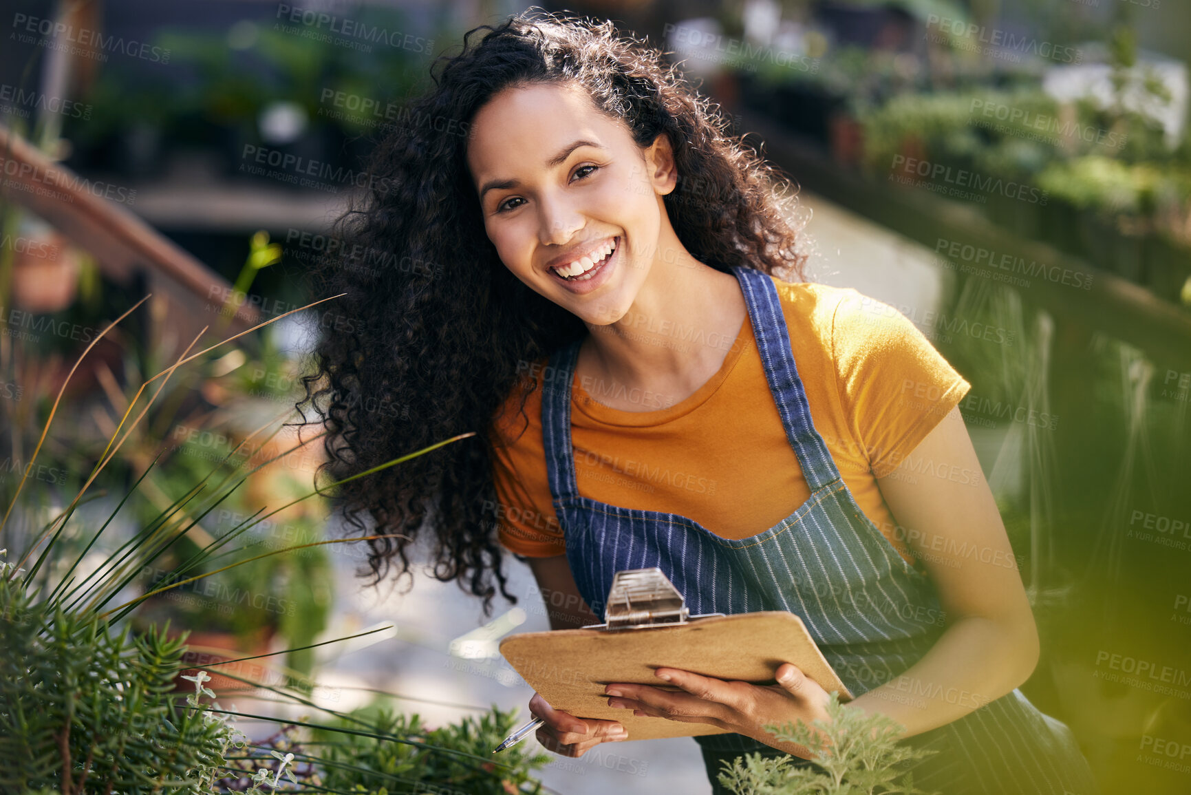 Buy stock photo Happy woman, portrait and small business with clipboard for plant, flower or garden service in nature. Female person, florist or gardener with checklist in agriculture, conservation or natural growth