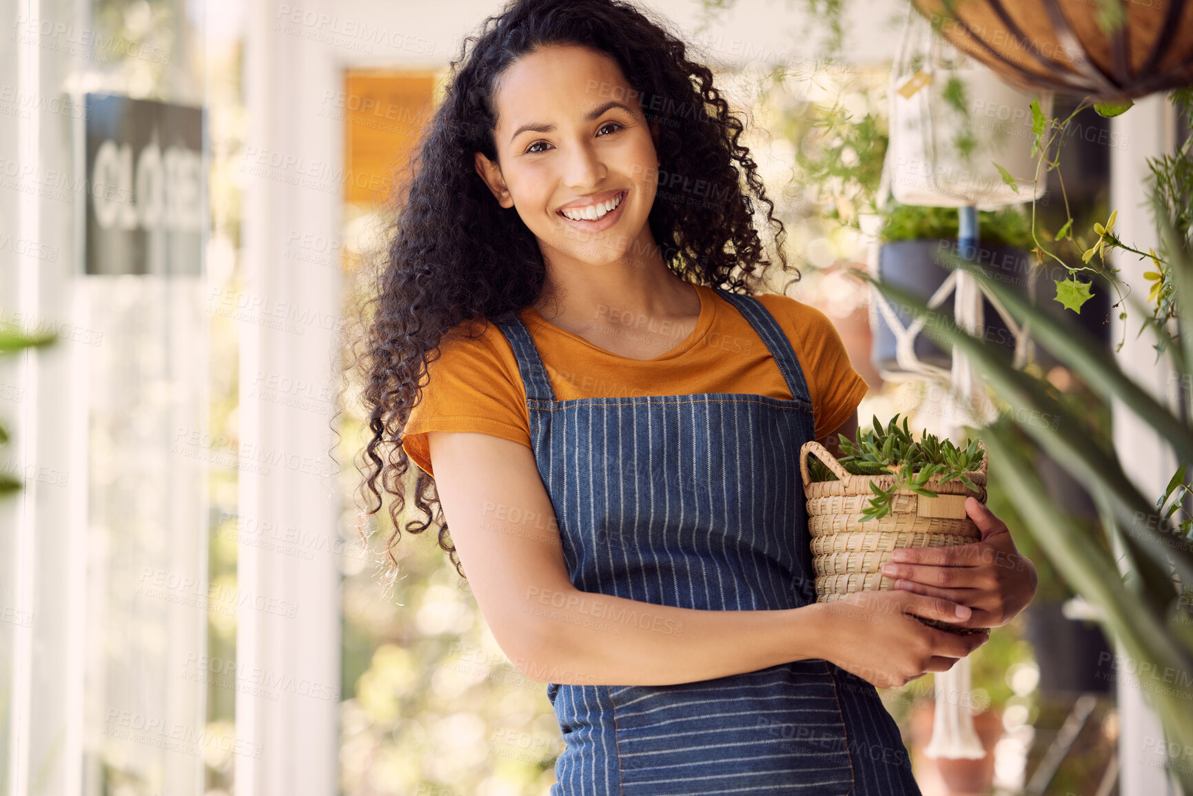 Buy stock photo Garden store, portrait and smile with woman in nursery for growth, small business or sustainability. Flowers, gardening and potted plants with happy person at startup for green retail or sale