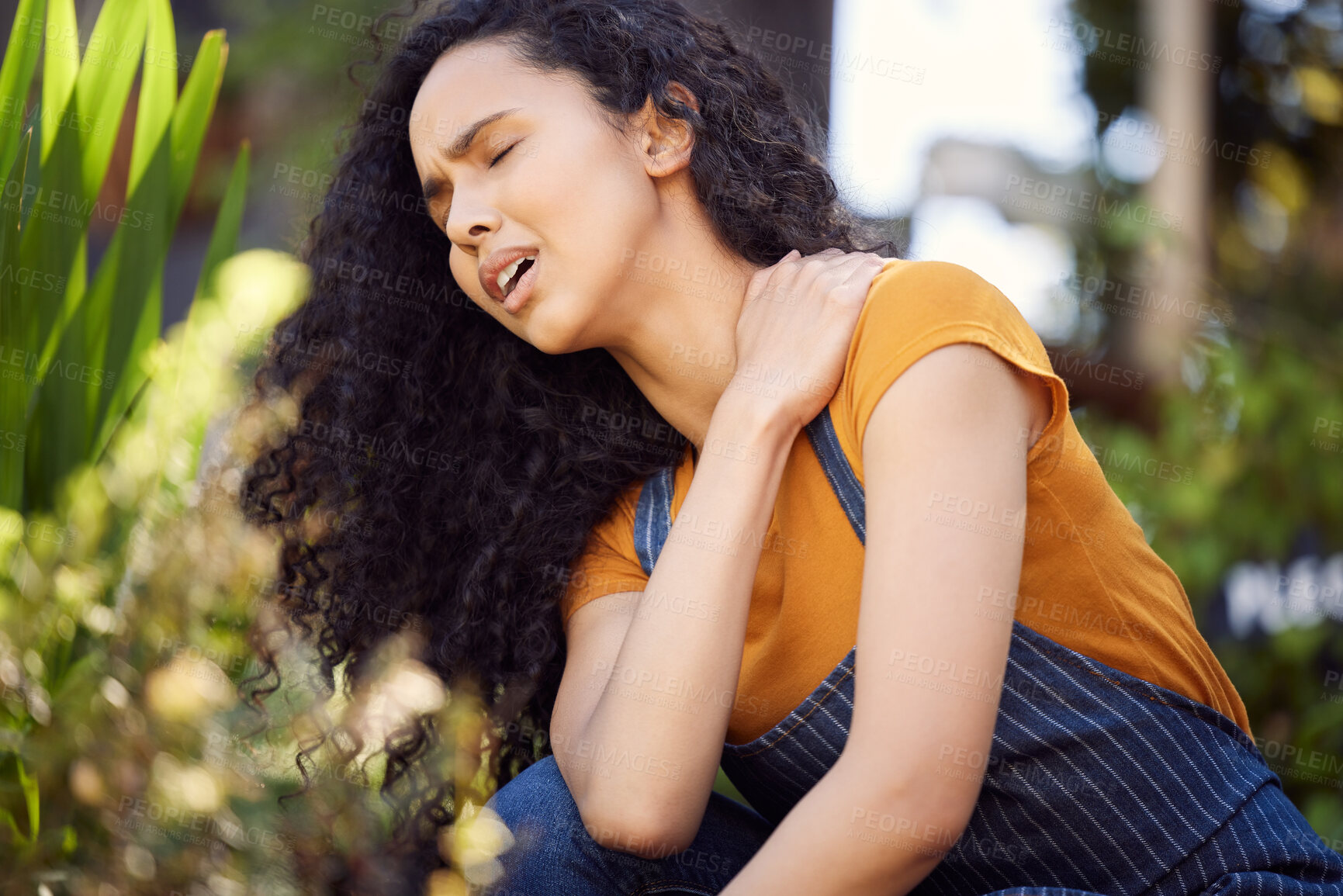 Buy stock photo Tired, shoulder pain and woman in garden with injury, accident or florist sick of stress outdoor in nature. Neck, worker or muscle problem for fatigue, arthritis or medical fibromyalgia in greenhouse