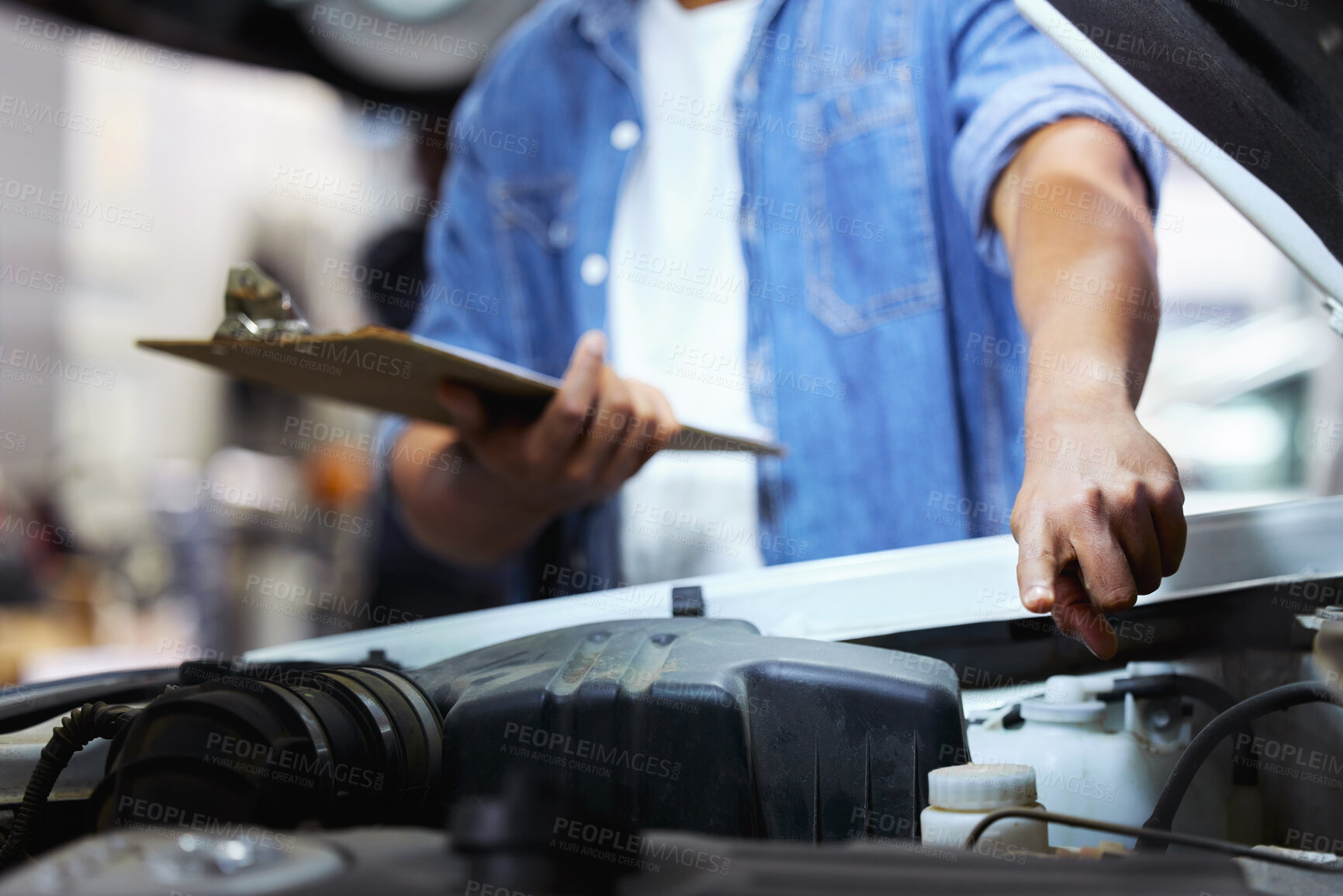 Buy stock photo Hands, man and mechanic with car inspection, clipboard and documents for safety, quality control and service. Person, closeup and employee with paperwork, engine and review vehicle with feedback