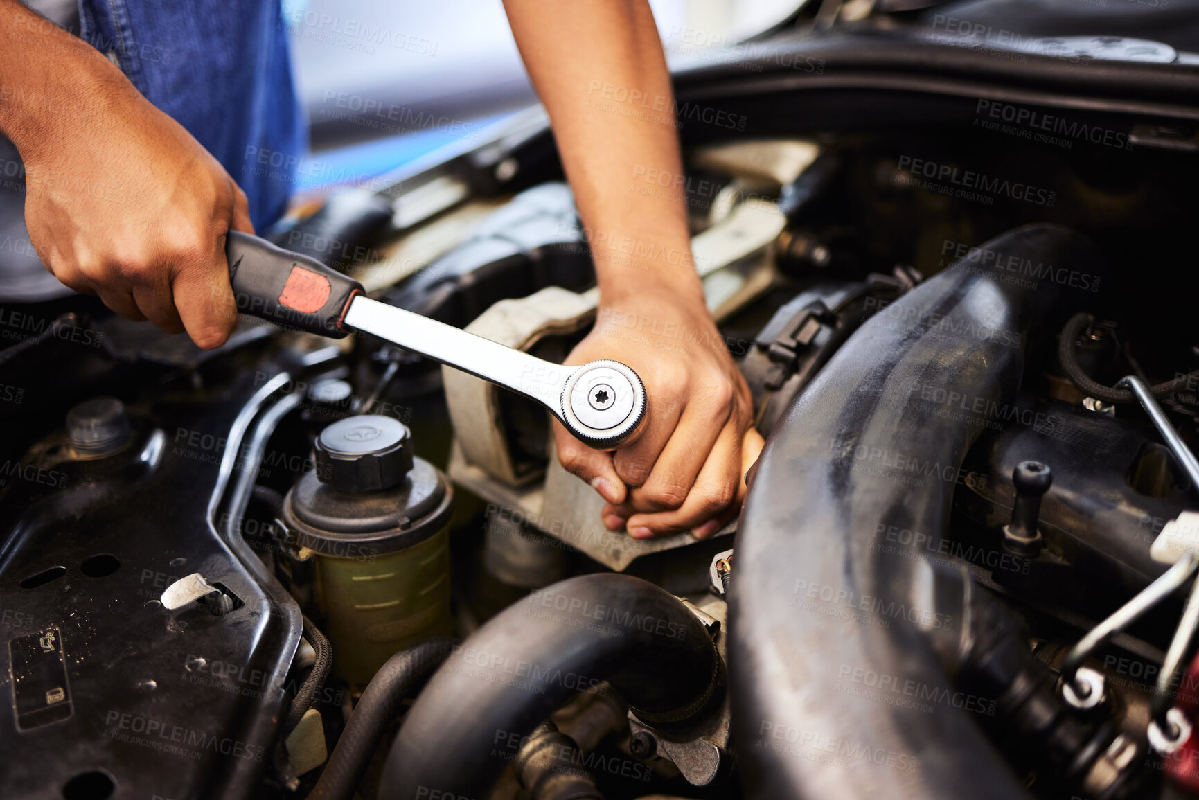 Buy stock photo Person, hands and mechanic with spanner for fixing engine in workshop for motor maintenance and service. Industry, engineer and vehicle repairs with oil change in garage for routine car checkup