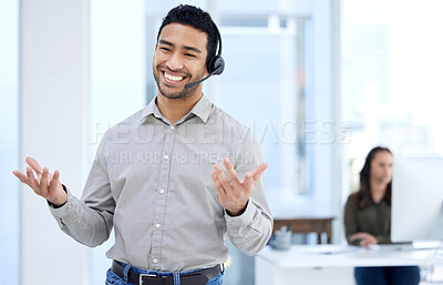 Buy stock photo Portrait of a young businessman using a headset in a modern office