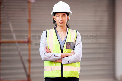Buy stock photo Shot of a young woman working on a construction site