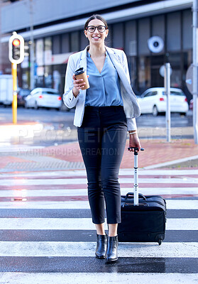 Buy stock photo Shot of a young businesswoman making her way to the airport for a trip