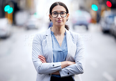 Buy stock photo Street, portrait or serious businesswoman with arms crossed, confidence or suit in firm or company. City, corporate attorney or proud female lawyer on commute ready for career, job or opportunity