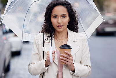 Buy stock photo Umbrella, portrait or business woman with coffee in city for travel, immigration or work opportunity. Rain, cover or entrepreneur in London for winter commute, mindset or dream job hustle resilience