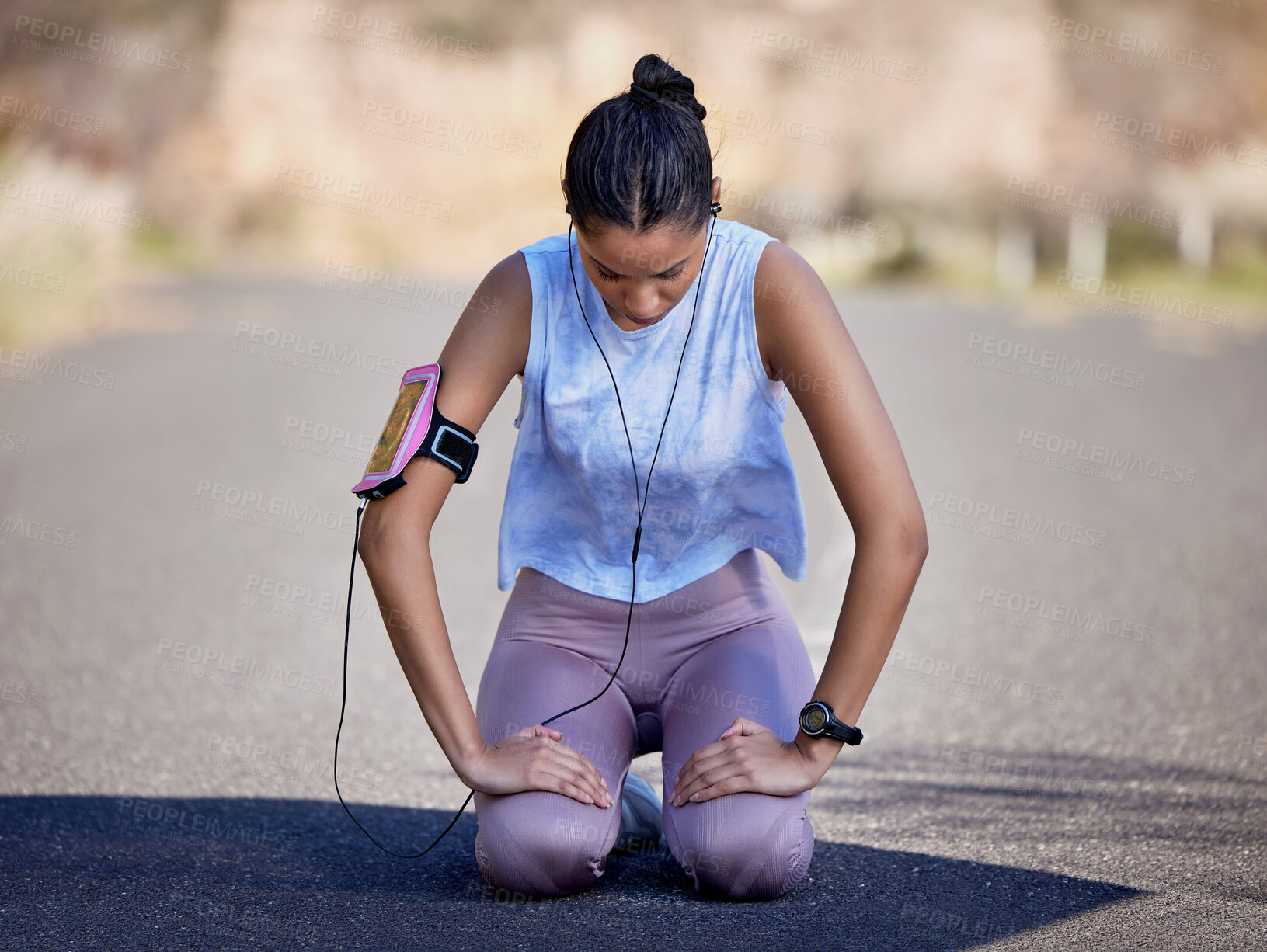 Buy stock photo Run, tired and woman with fatigue on ground for fitness, exercise break and listening to music in road. Exhausted, runner and athlete with headphones on floor for workout playlist, training and rest