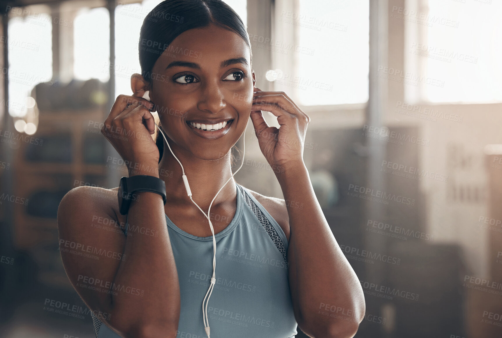 Buy stock photo Woman, gym and music with thinking, fitness vision and inspiration for workout, training and wellness. Indian girl, audio or streaming subscription for listening, exercise and happiness for self care