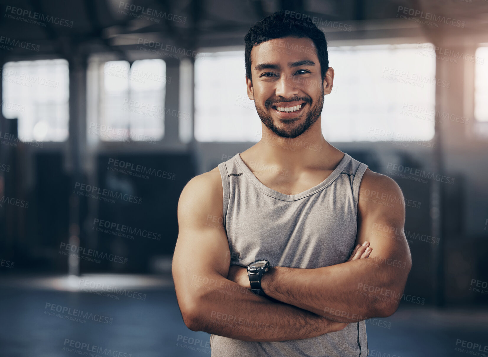Buy stock photo Fitness, smile and portrait of a personal trainer with crossed arms in the gym before a strength workout. Confidence, happy and male athlete after a bodybuilding arm exercise in a sports center.