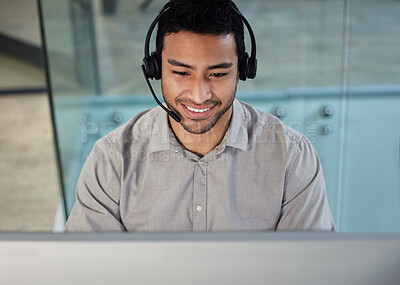 Buy stock photo Call center, customer support and male consultant in the office doing research on crm communication. Headset, technology and telemarketing agent working on an online client consultation in workplace.