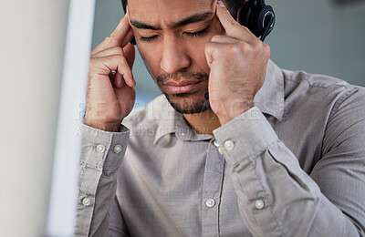 Buy stock photo Man, face and headache as employee at call center with customer or client support and service. Office, crm and advisor or consultant on stress or tired with job, overtime and deadline or target