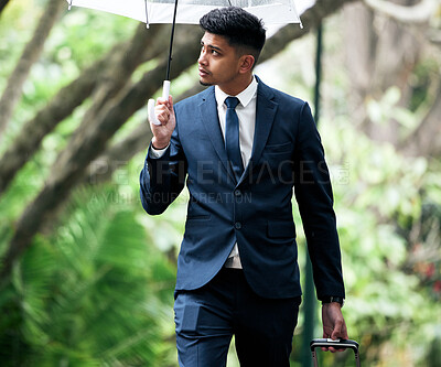 Buy stock photo Business, man and walk with umbrella in rain, outside and financial insurance for safety or security. Assurance, accountability and protection or cover for assets, future and investment for work
