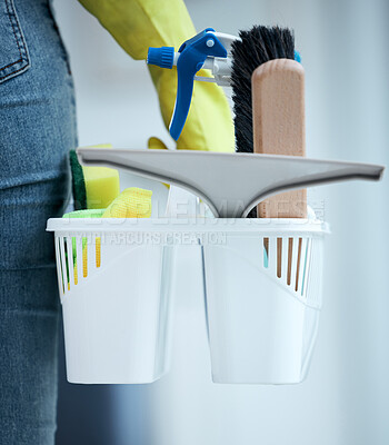 Buy stock photo Cleaner, basket and cleaning supplies at home with detergent for hygiene or safety from bacteria or germs. Housekeeper, person and service with tools or products to protect from spread of virus 