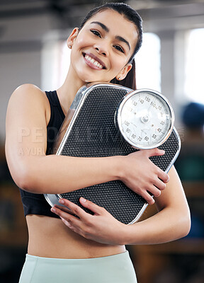 Buy stock photo Fitness, scale and portrait of woman in gym for results, cardio workout or weight loss progress. Wellness, athlete and happy female person for healthy body, exercise goal or physical training