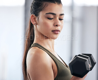 Buy stock photo Woman, fitness and dumbbell in gym for power, exercise and training for strong arm muscle. Female person, bodybuilder and athlete for sport and health, club and equipment for workout or weightlifting