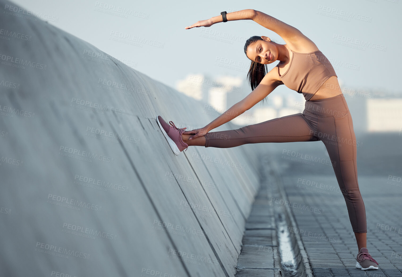 Buy stock photo Fitness, stretching and woman in outdoor workout for body health and wellness on promenade. Exercise, commitment and girl runner in muscle warm up for morning marathon training, performance or cardio