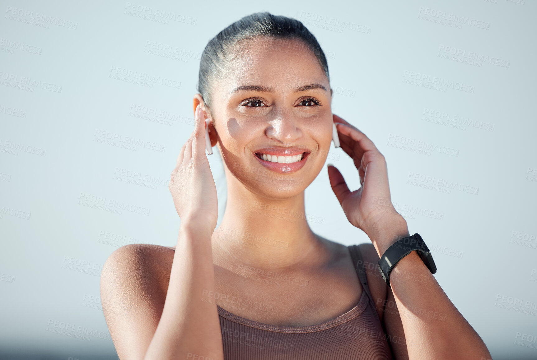 Buy stock photo Woman, smile and earpods for running outdoor, fitness and cardio with audio streaming for entertainment. Listening to music, sound and wireless tech with connection, exercise and energy in nature