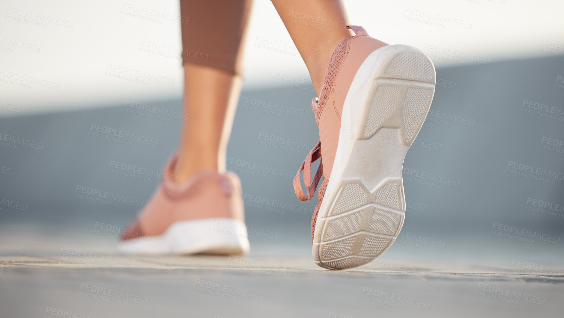 Buy stock photo Closeup shot of an unrecognisable woman running outdoors