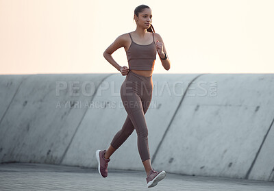 Buy stock photo Fitness, running and girl in outdoor workout in body health, energy or wellness on promenade. Exercise, commitment and woman runner with dedication to morning marathon training, performance or cardio