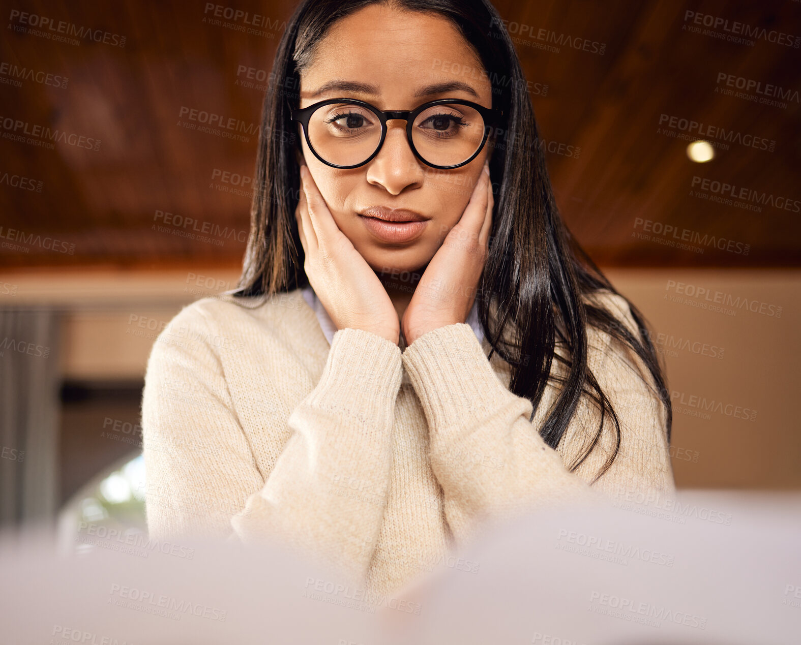 Buy stock photo Shot of a college student looking stressed while studying at home