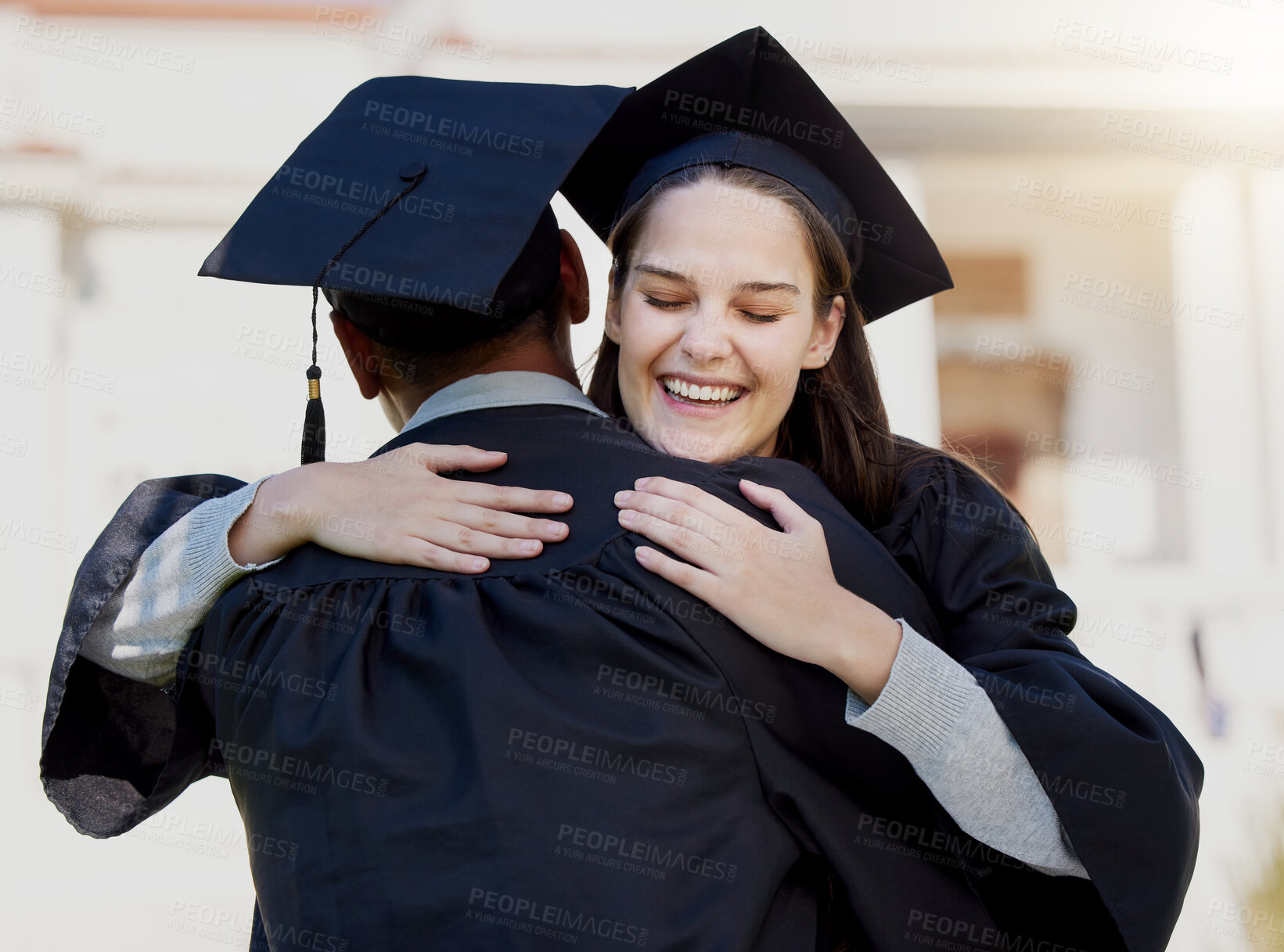 Buy stock photo Friends, hug and happy at graduation ceremony, celebration and proud of education together. People, embrace and support at college or university for achievement or learn success, graduate and smile