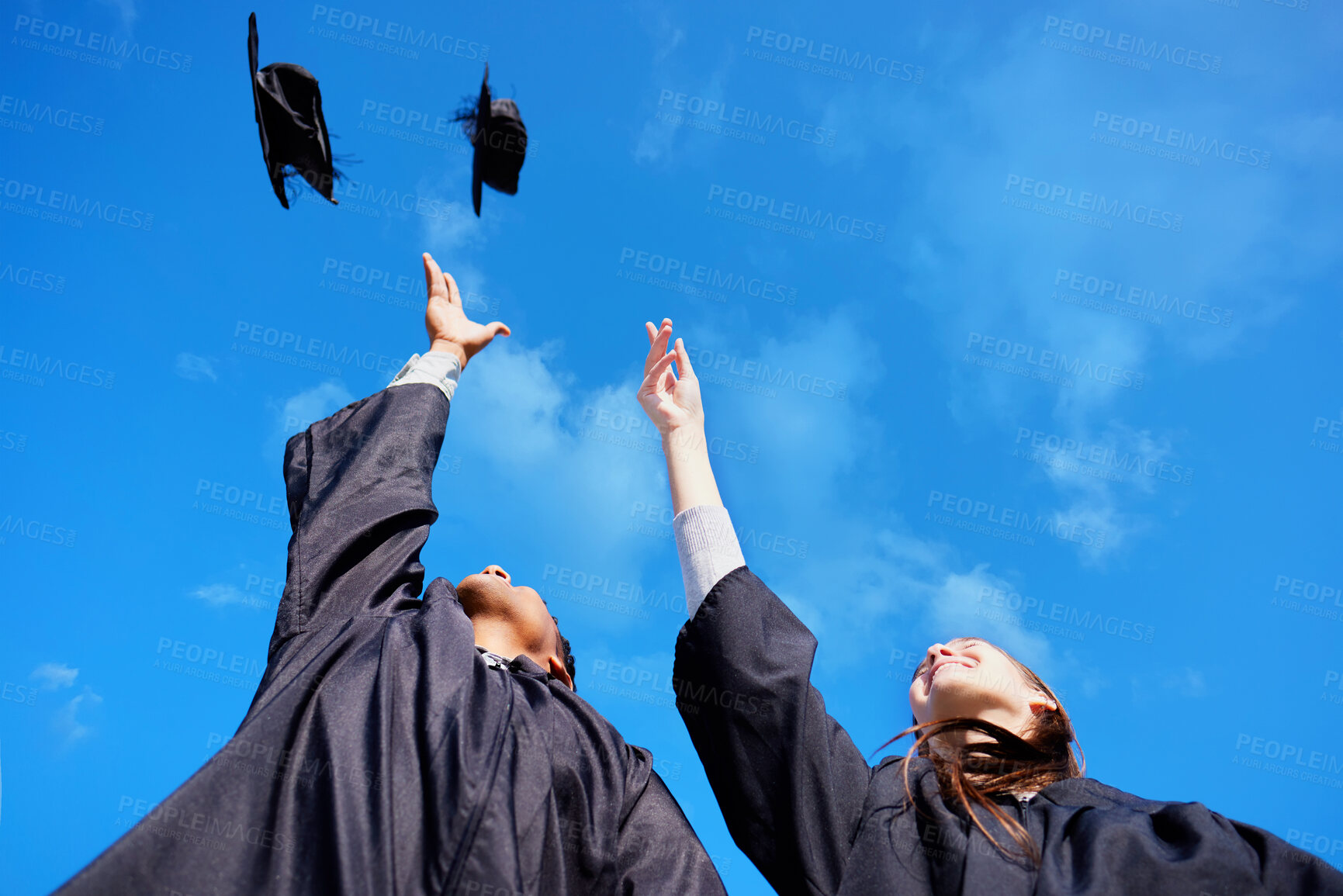 Buy stock photo Students, smile and graduation cap in sky on campus with celebration and success. People, college and university classmate or friends with fun or happy for qualification competition and excited