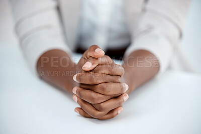 Buy stock photo Shot of a businesswoman resting her hands on the table