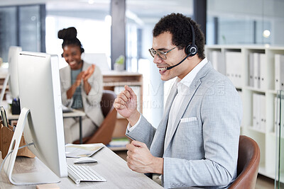 Buy stock photo Call center, man and celebrate success with headset and computer at telemarketing or customer service desk. Male agent or consultant excited for bonus, target goal or deal in crm, support or sales