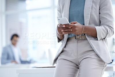 Buy stock photo Phone, office and closeup of a businesswoman networking on social media or the internet. Technology, professional and female employee typing for browsing on a mobile app with a cellphone in workplace